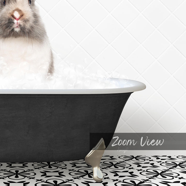 A fluffy white rabbit sitting in a black bathtub filled with bubbles, with a text overlay that reads "Zoom View".