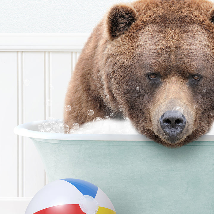 a large brown bear sitting in a bath tub