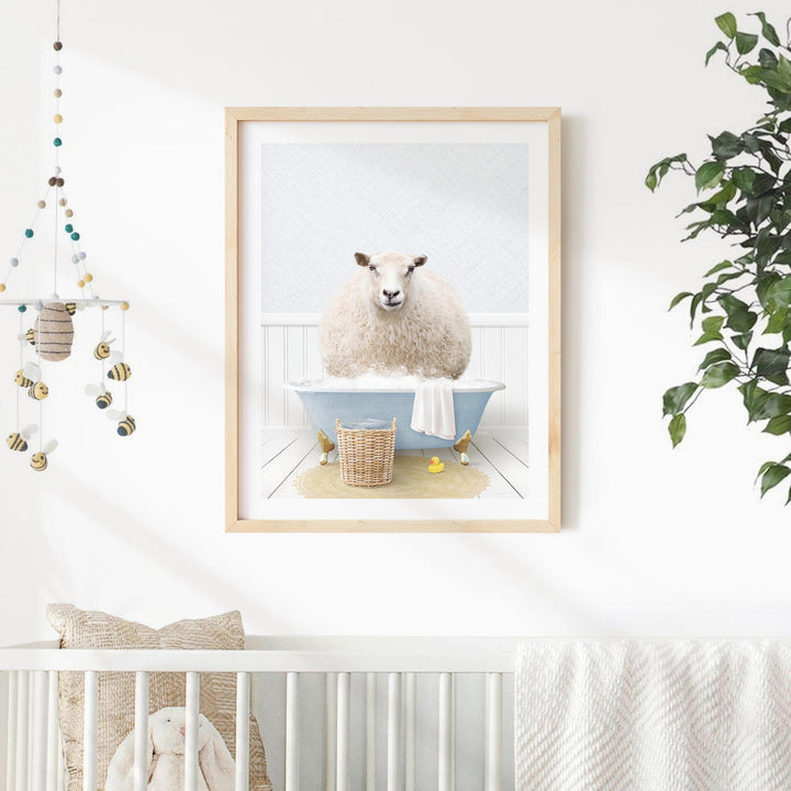 A framed image of a sheep sitting in a bathtub, surrounded by various objects such as a basket, a towel, and a plant.