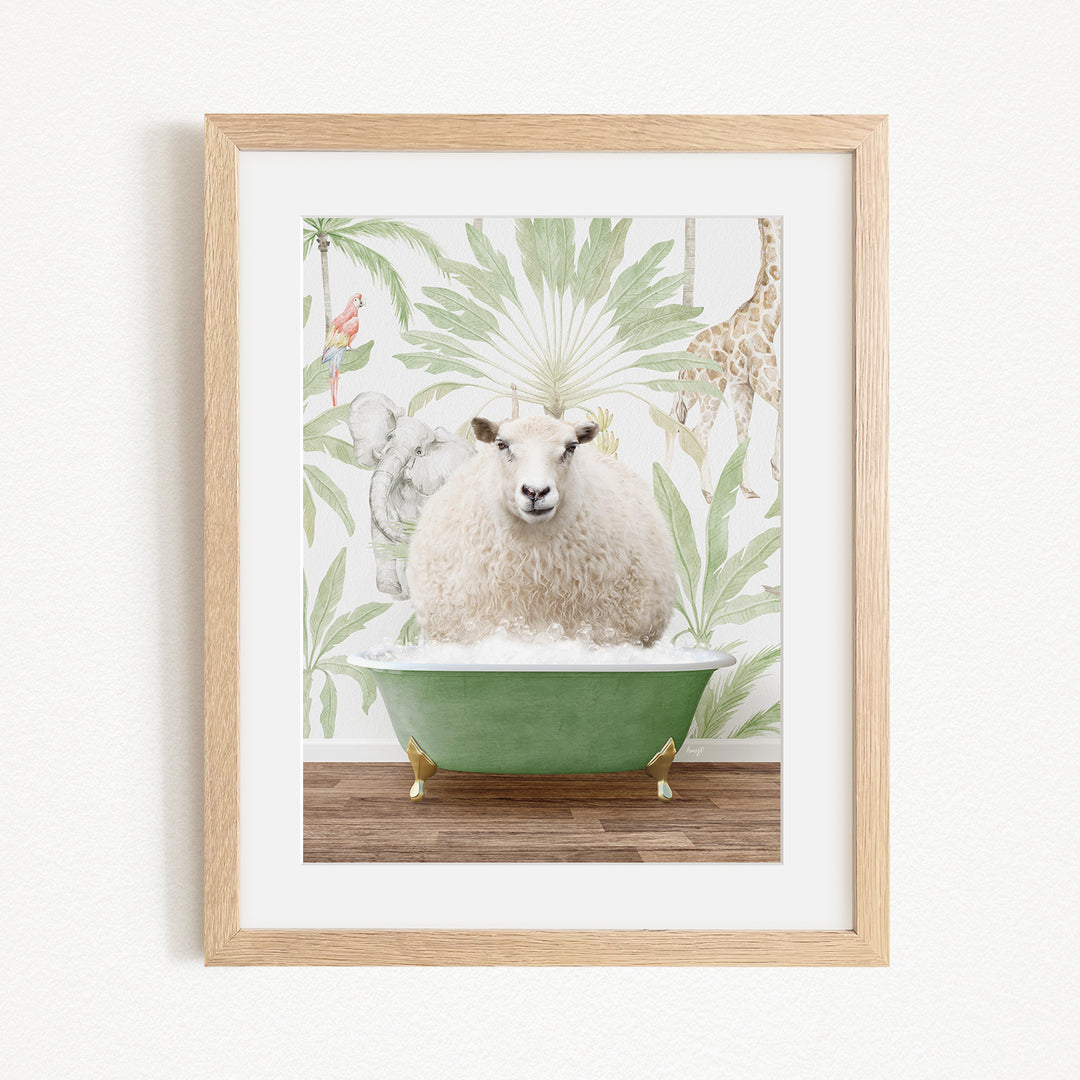 A framed image depicting a sheep sitting in a green bathtub, surrounded by a tropical wallpaper with various animals.