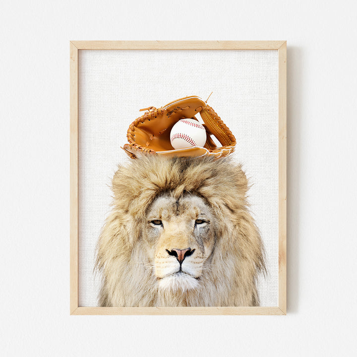 a picture of a lion with a baseball hat on its head