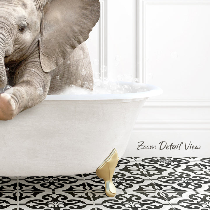 A baby elephant sitting in a white bathtub filled with water, surrounded by a black and white patterned floor.