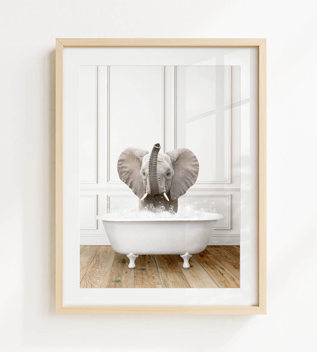 A gray elephant is sitting in a white bathtub filled with water, creating a playful and whimsical scene.
