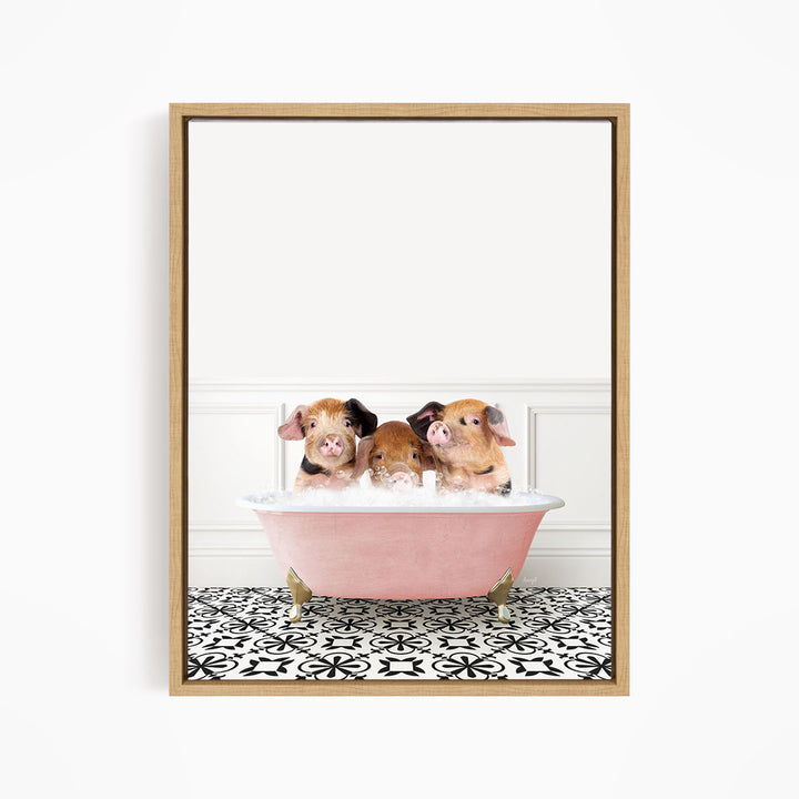 Three adorable pigs sitting in a pink bathtub, looking at the camera with their heads in the water.