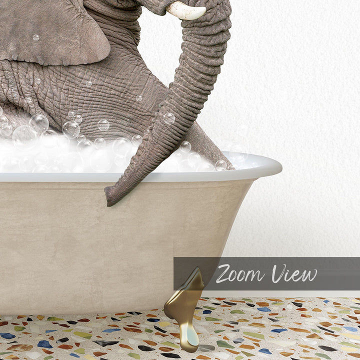 A large elephant is sitting in a bathtub filled with bubbles, with its trunk submerged in the water.