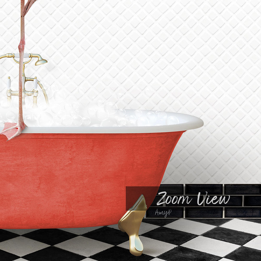 A red clawfoot bathtub filled with water, with a gold clawfoot shoe resting on the floor next to it.