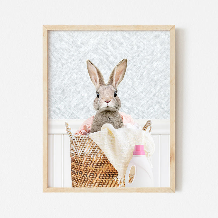 a picture of a rabbit sitting in a basket