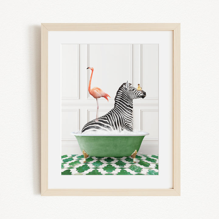 A framed image depicting a zebra sitting in a green bathtub, with a flamingo standing on its back and a bird perched on its head.