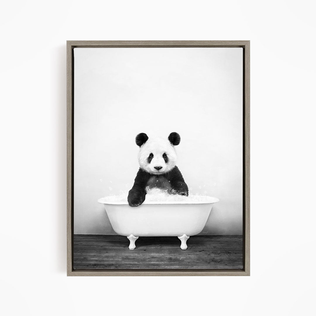 A panda bear sitting in a bathtub filled with water, creating a whimsical and playful scene.