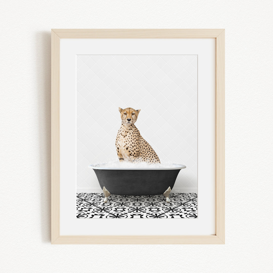 A cheetah sitting in a bathtub filled with water, surrounded by a black and white patterned floor.