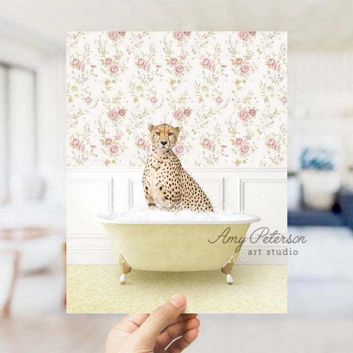 a hand holding up a card with a cheetah sitting in a bathtub