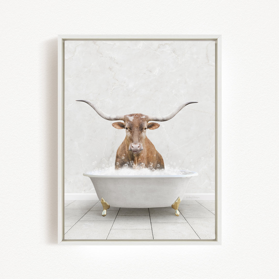 A bull with long horns is sitting in a white bathtub filled with water, creating a whimsical and humorous scene.