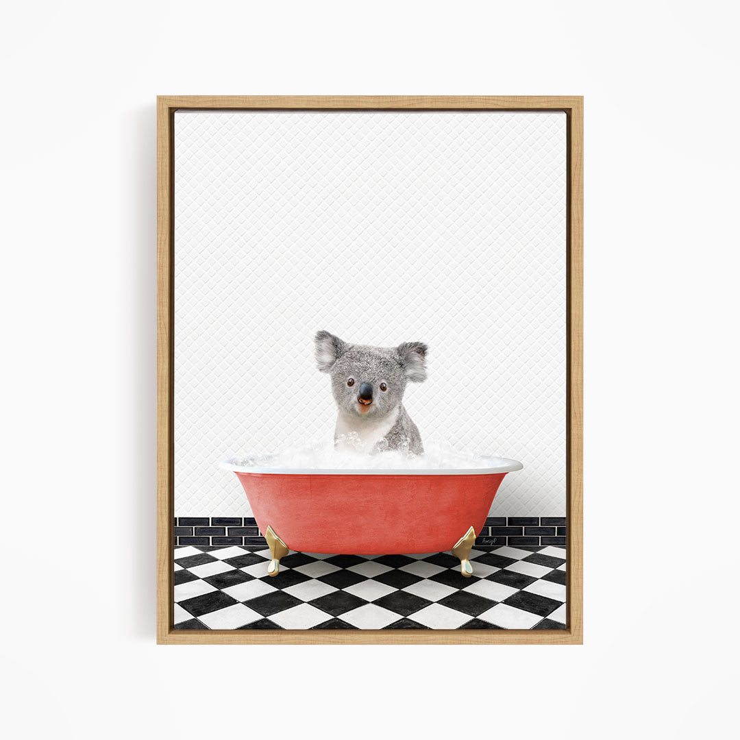 A koala bear sitting in a red bathtub filled with water, surrounded by a black and white checkered floor.