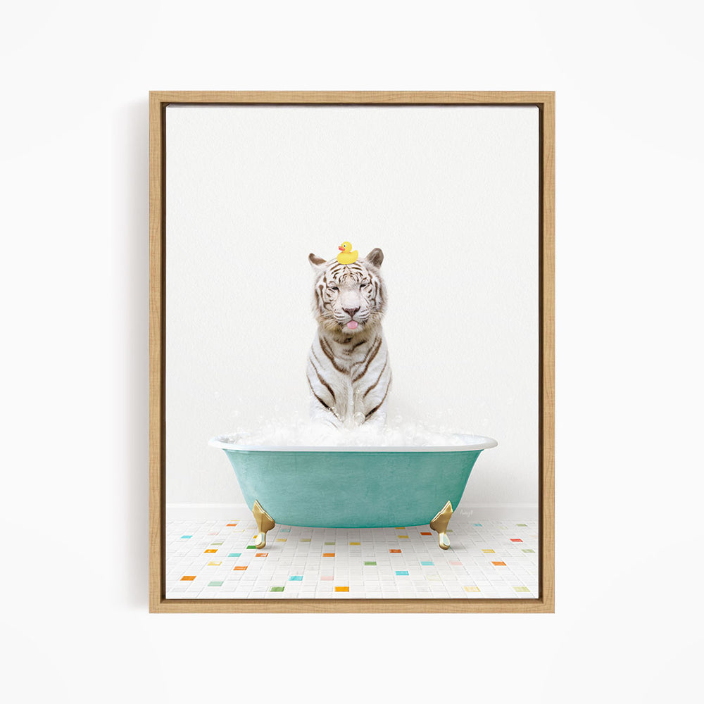 A white tiger is sitting in a blue bathtub, surrounded by colorful tiles on the floor.