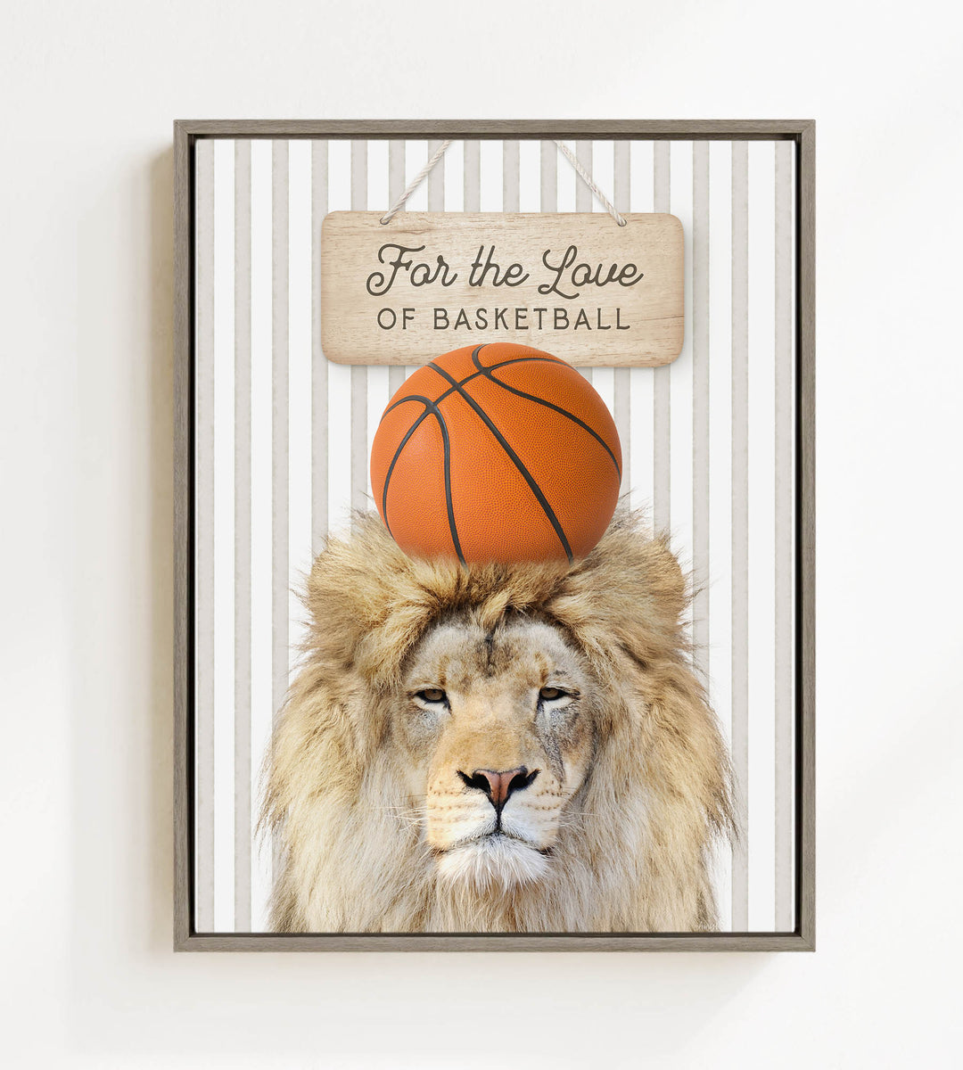 A framed image of a lion with a basketball on its head, accompanied by a wooden sign that reads "For the Love of Basketball".