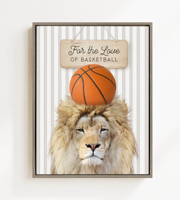 A framed image of a lion with a basketball on its head, accompanied by a wooden sign that reads "For the Love of Basketball".