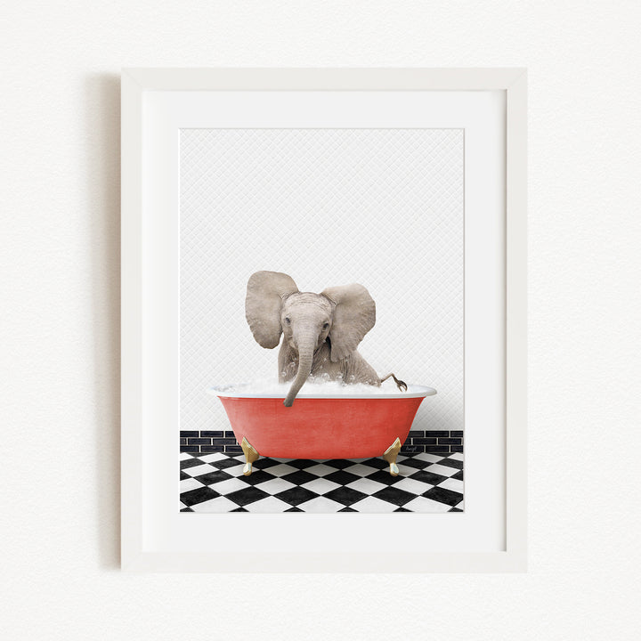 A gray elephant is sitting in a red bathtub on a black and white checkered floor.