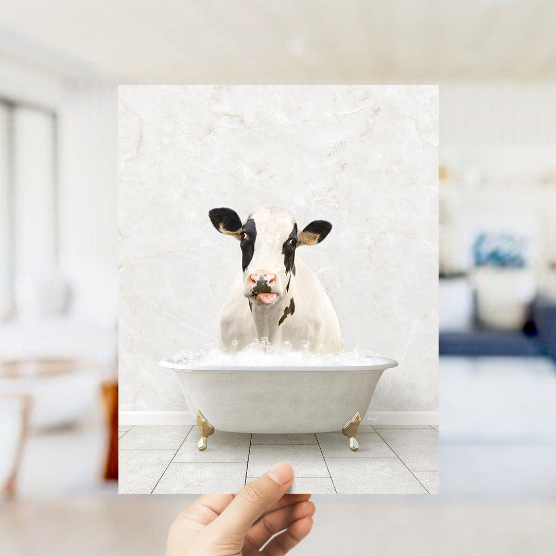 A cow is sitting in a bathtub filled with water, with bubbles around it, creating a whimsical and playful scene.
