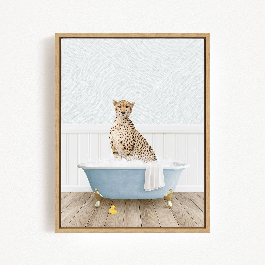 A cheetah sitting in a blue bathtub filled with water, with a rubber duck floating nearby.