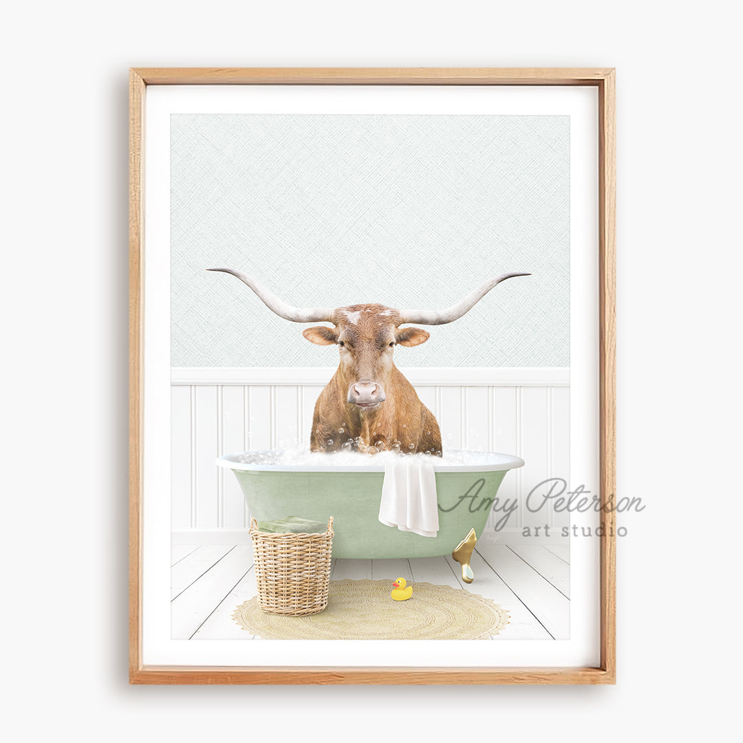 a picture of a cow in a bathtub with long horns