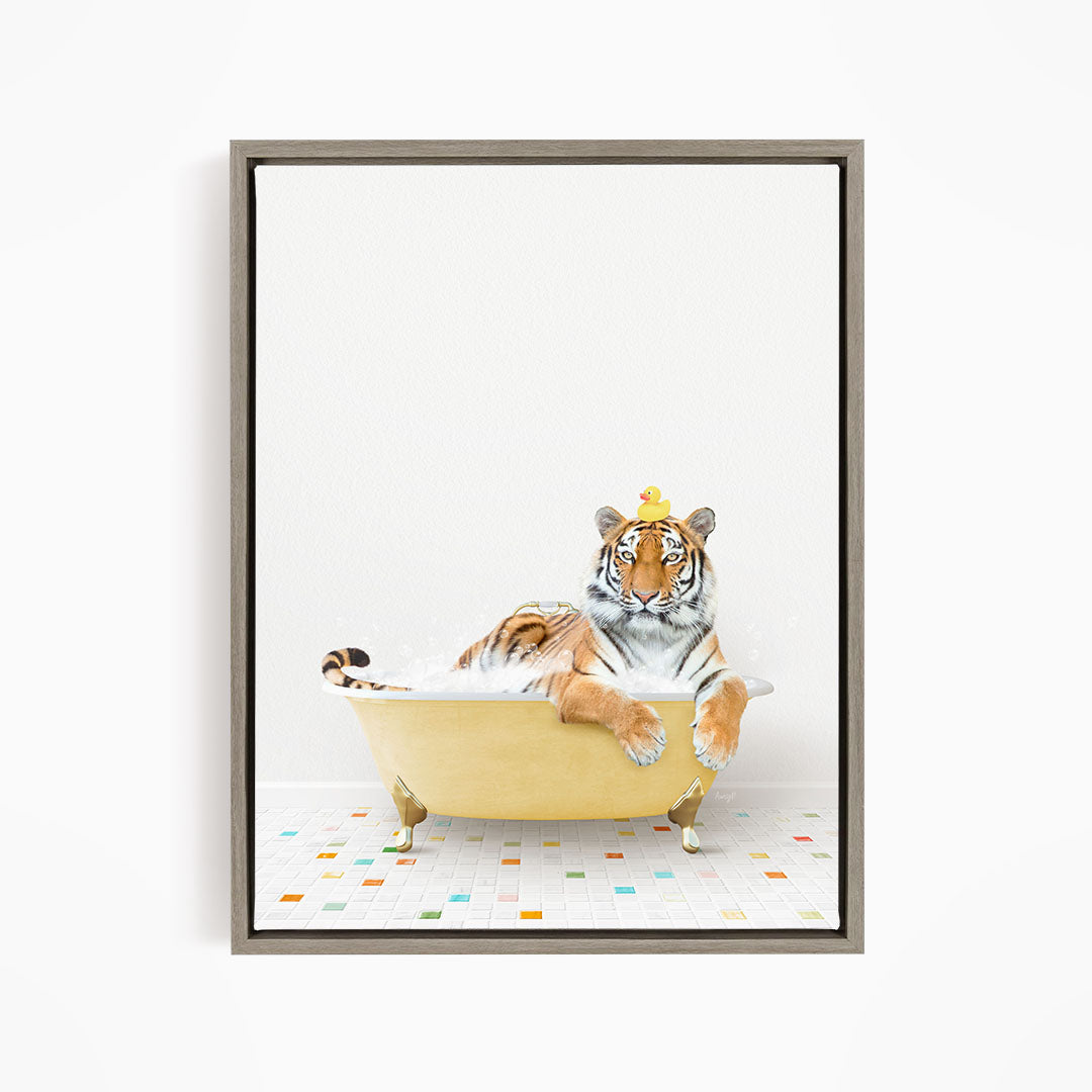 A tiger wearing a yellow crown is sitting in a yellow bathtub, surrounded by colorful tiles on the floor.