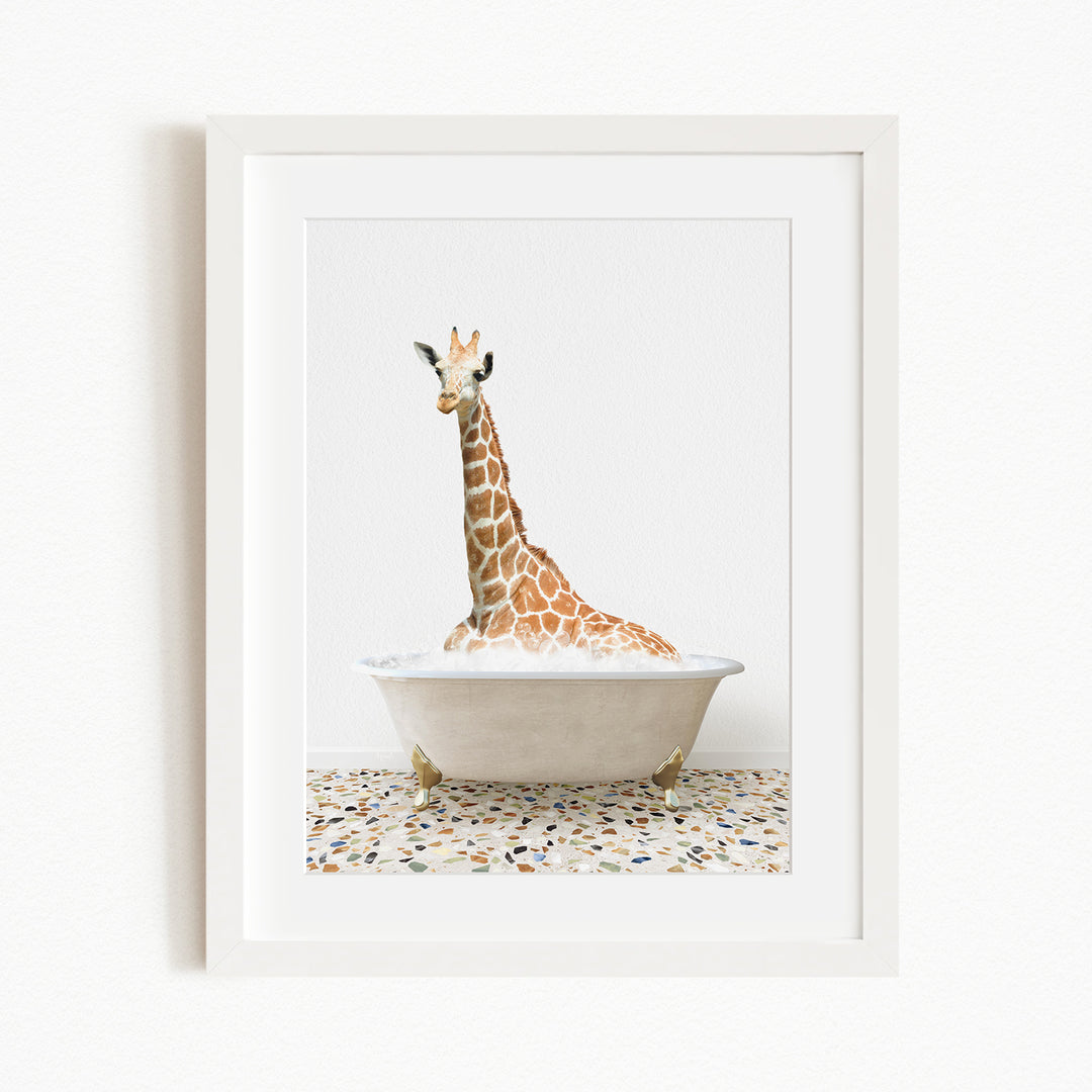 A giraffe is sitting in a white bathtub filled with water, creating a whimsical and playful scene.