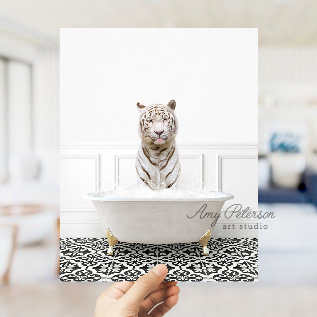 a white tiger sitting in a bath tub