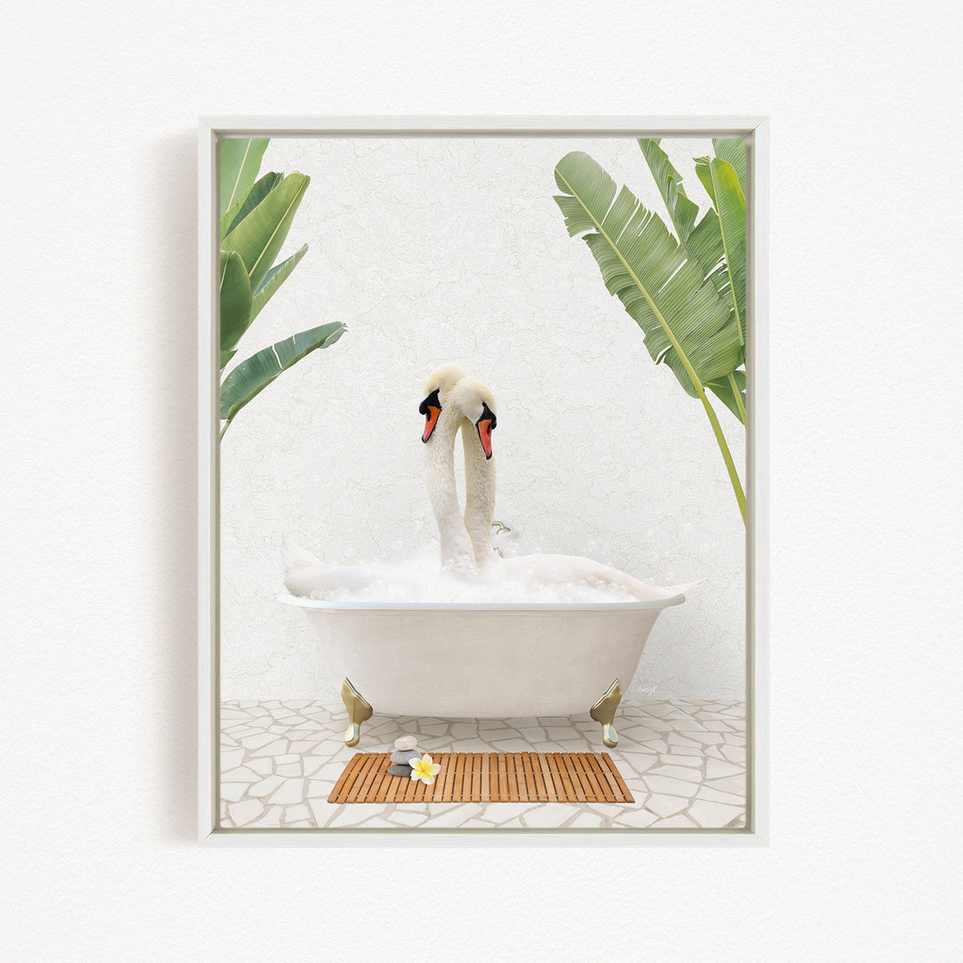 A pair of swans sitting in a white bathtub, surrounded by green leaves, creating a serene and relaxing scene.