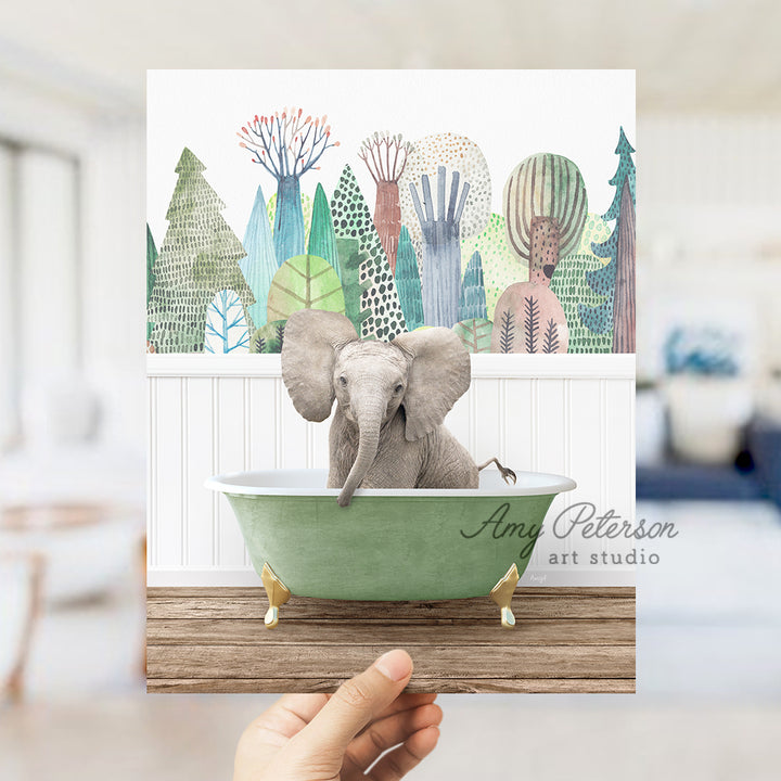 a person holding a card with an elephant in a bathtub