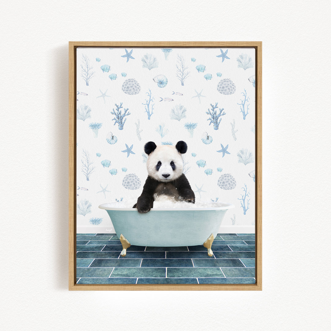 A panda bear sitting in a bathtub filled with water, surrounded by a blue and white ocean-themed wallpaper.