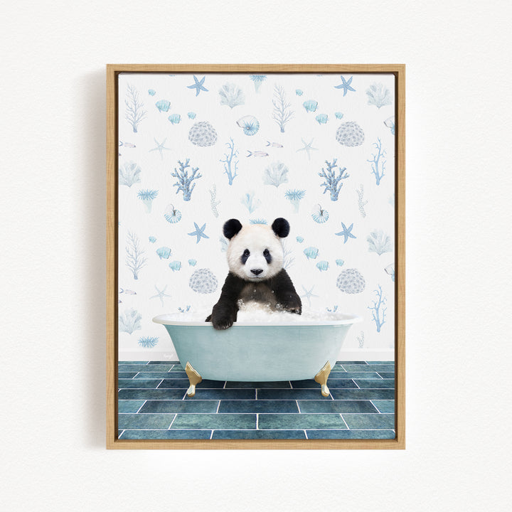 A panda bear sitting in a bathtub filled with water, surrounded by a blue and white ocean-themed wallpaper.