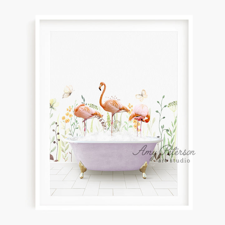 a pink bath tub with flamingos in it