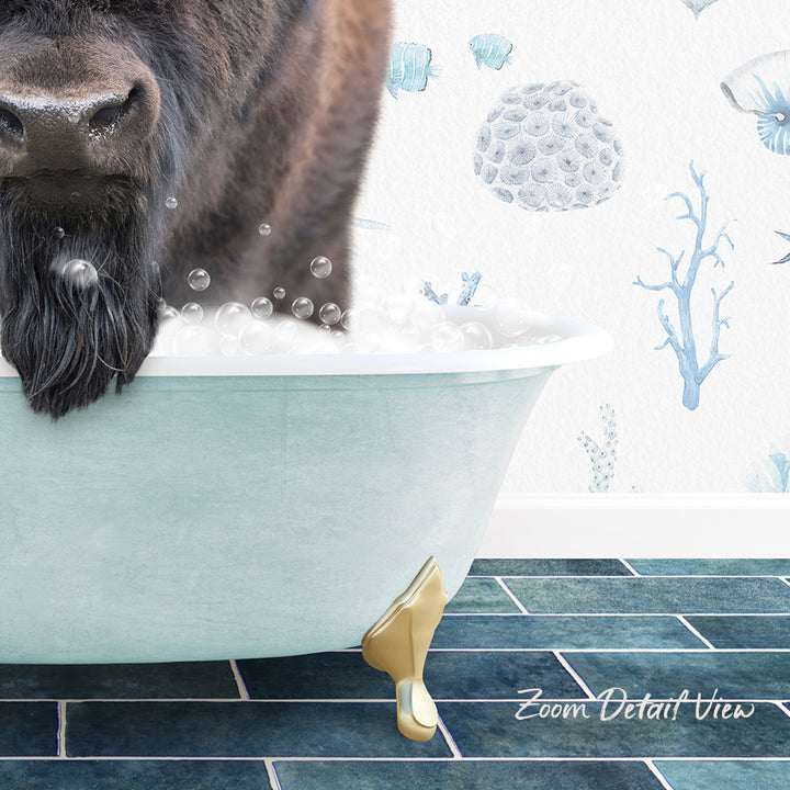 A dog is sitting in a bathtub filled with bubbles, with a blue and white underwater wallpaper in the background.