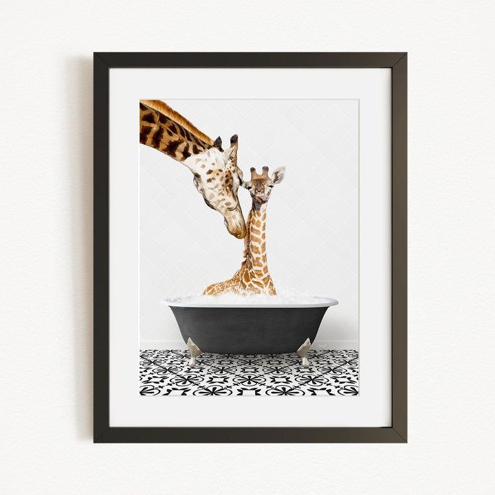 A mother giraffe and her baby giraffe are sitting together in a black bathtub filled with water, creating a heartwarming scene.