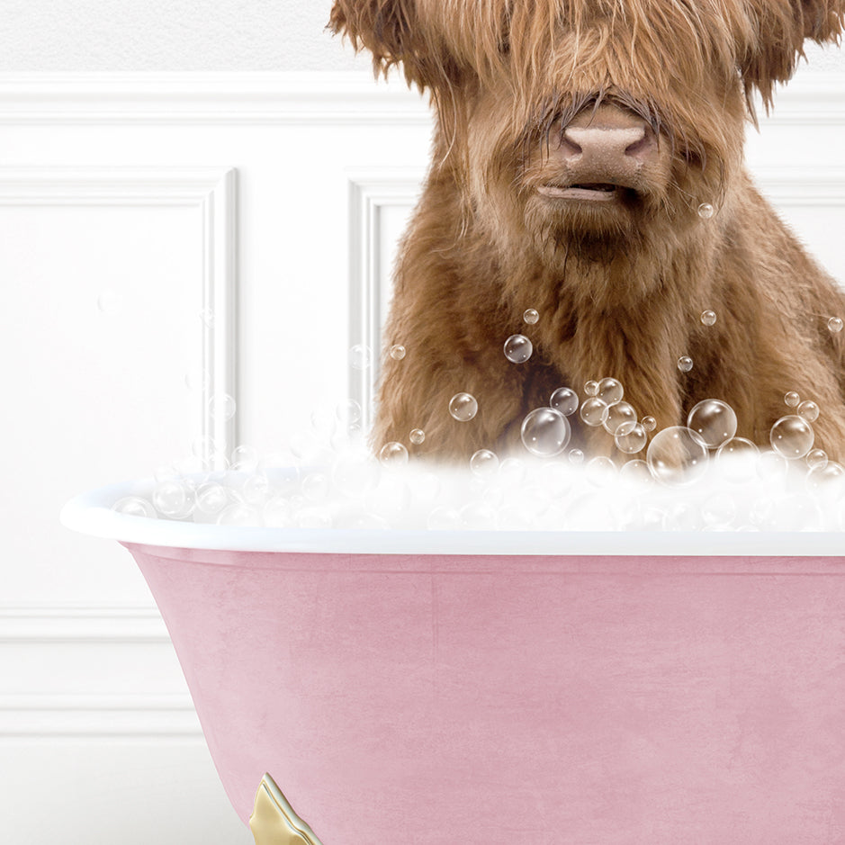 a brown dog sitting in a bath tub filled with bubbles