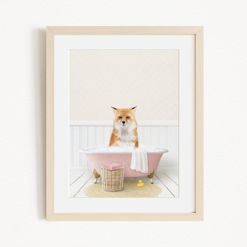 A fox is sitting in a pink bathtub filled with bubbles, surrounded by rubber ducks and a basket.