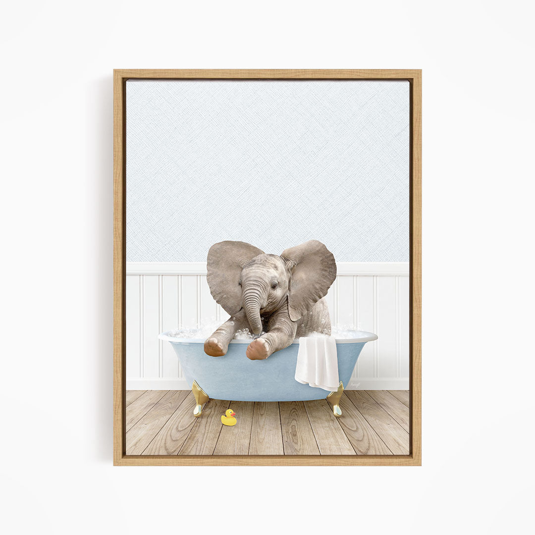 A baby elephant sitting in a blue bathtub filled with water, surrounded by rubber ducks.