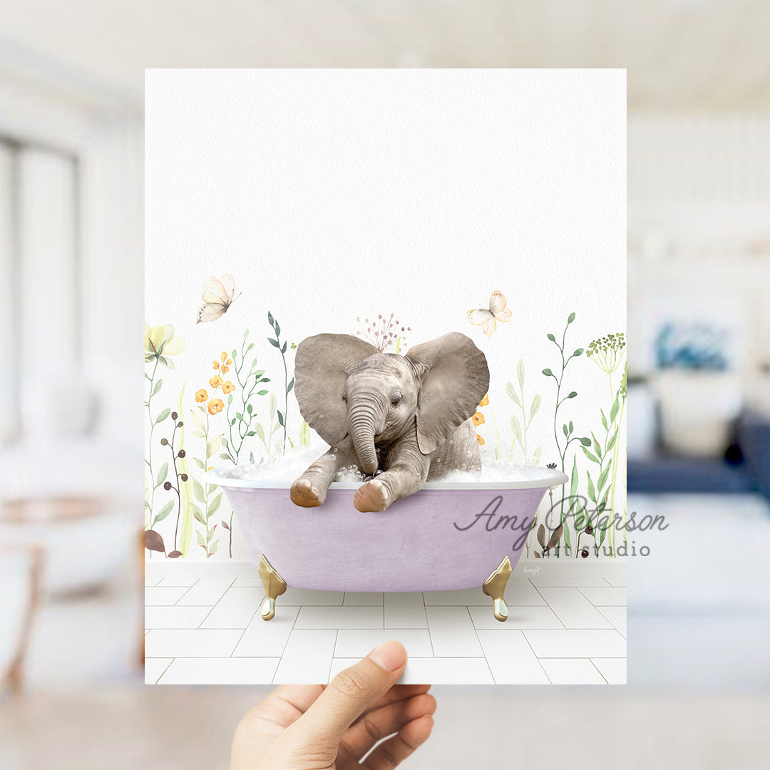 a person holding up a card with an elephant in a bathtub