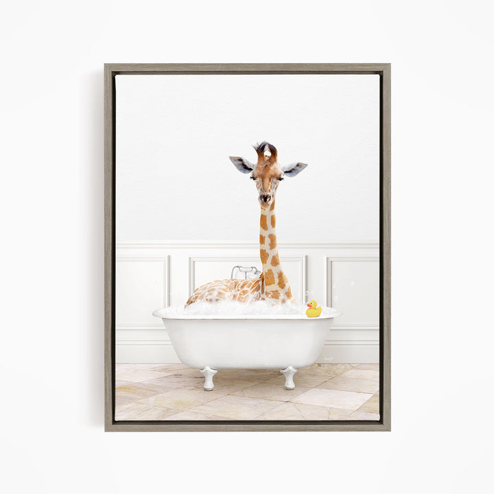 A giraffe is sitting in a white bathtub filled with water, surrounded by a yellow rubber duck.