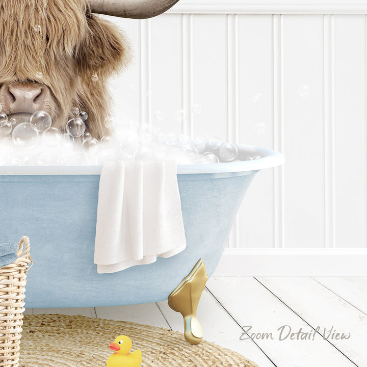 A large, shaggy-haired animal, possibly a yak or a similar creature, is sitting in a blue bathtub filled with bubbles, surrounded by a yellow rubber duck and a white towel.