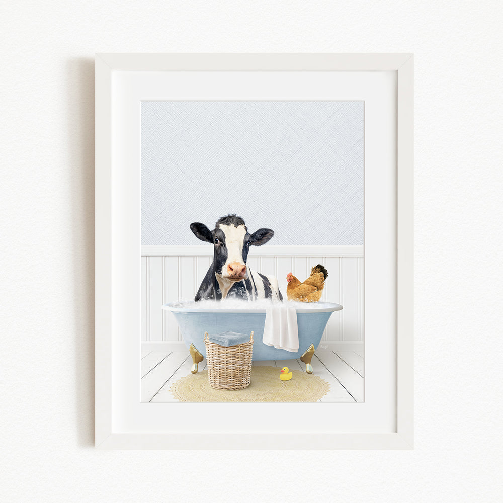 A black and white cow is sitting in a blue bathtub, surrounded by a chicken and a duck, creating a whimsical and playful scene.