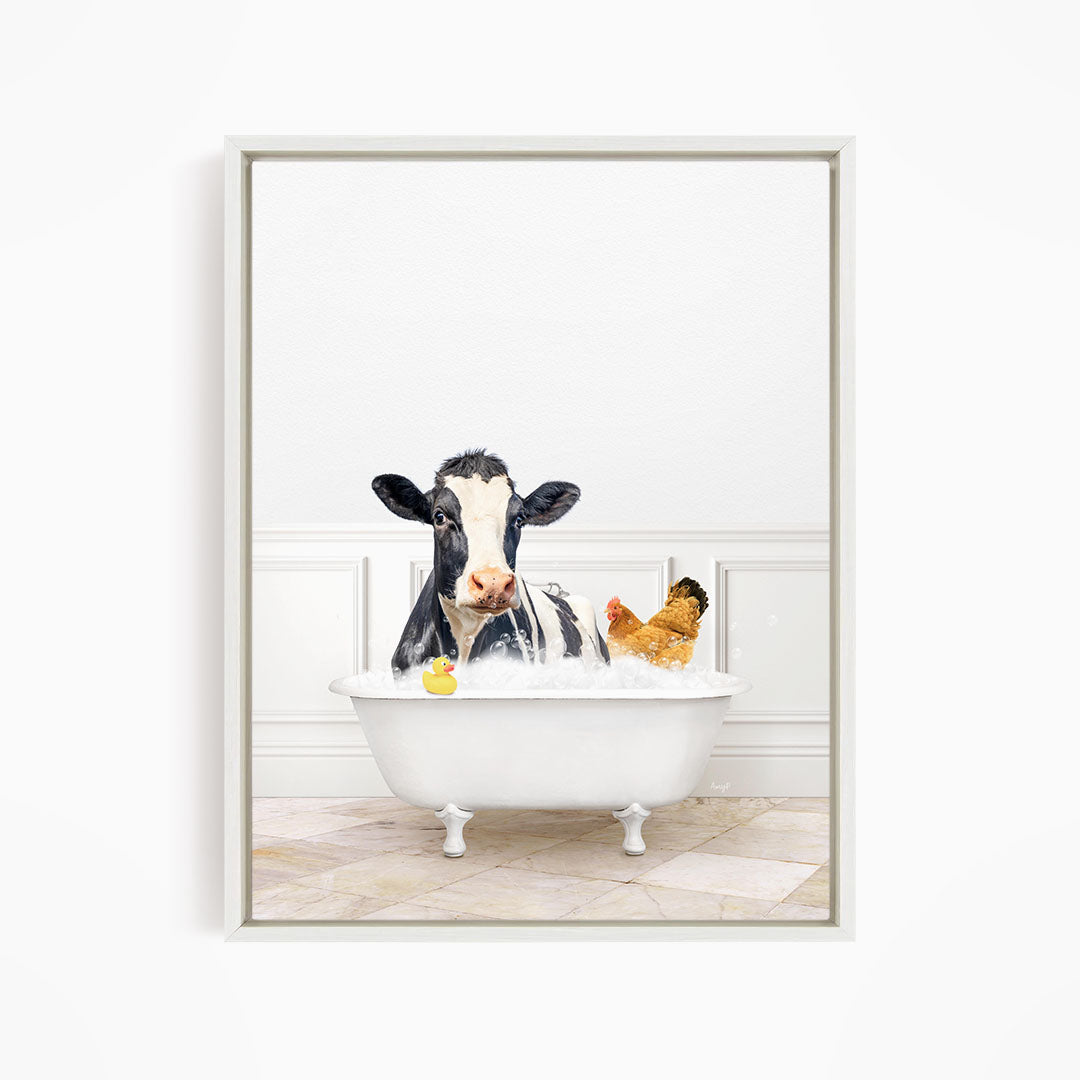 A black and white cow is sitting in a white bathtub, surrounded by a yellow rubber duck and a chicken, creating a whimsical and playful scene.