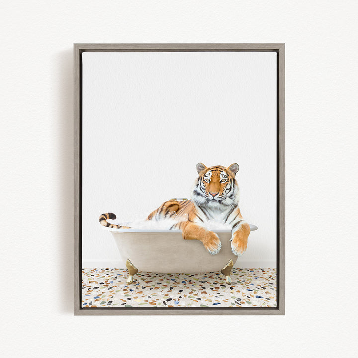 A tiger is sitting in a bathtub filled with water, appearing relaxed and comfortable.