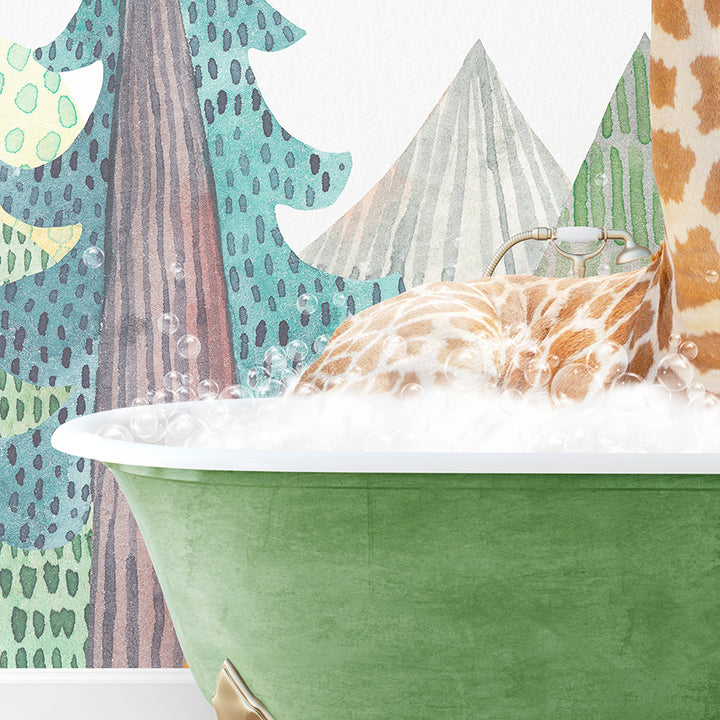 a giraffe laying in a green bath tub