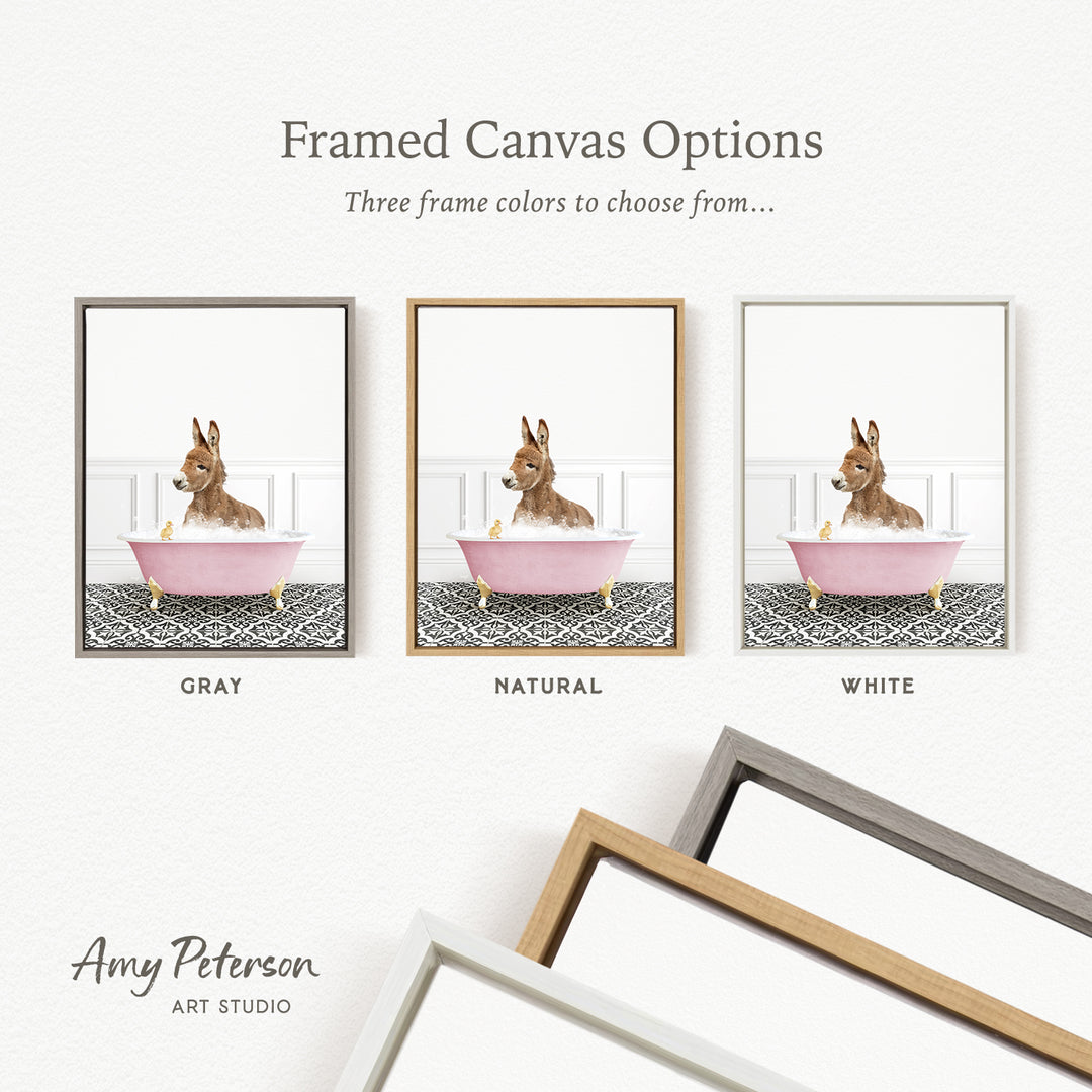 three framed canvas options featuring a brown donkey sitting in a pink bathtub, with each option having a different frame color.