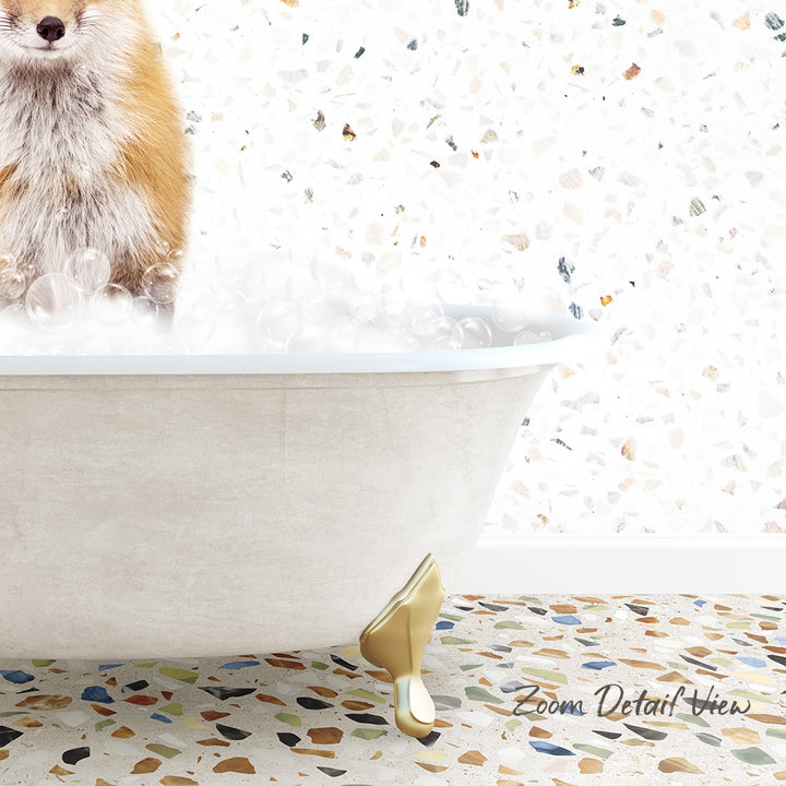 A dog is sitting in a bathtub filled with bubbles, with a mosaic floor in the background.