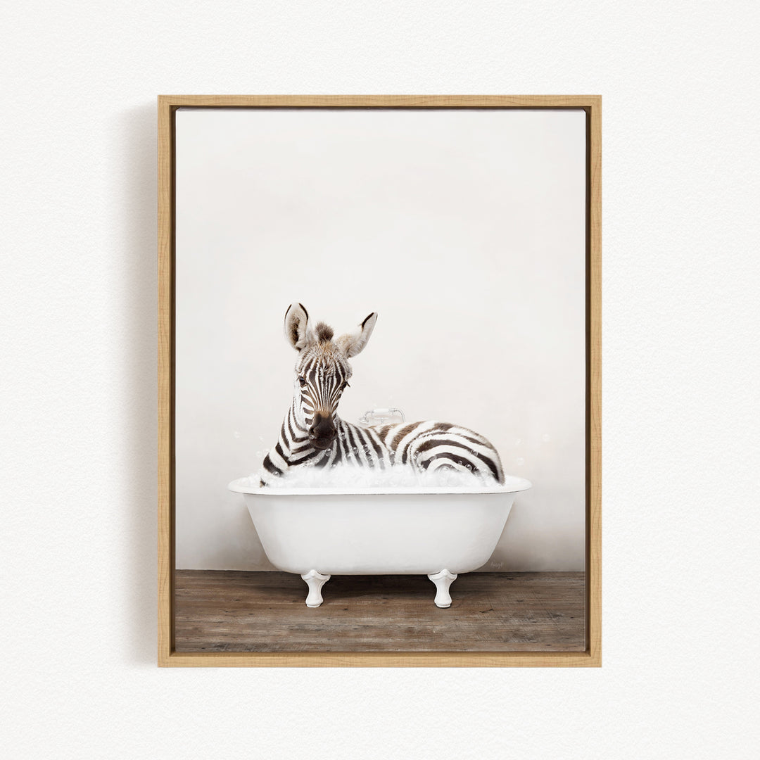 A zebra is sitting in a white bathtub, surrounded by bubbles, creating a whimsical and playful scene.