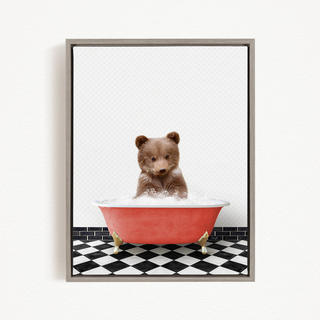 A cute brown bear sitting in a red bathtub filled with bubbles, surrounded by a black and white checkered floor.