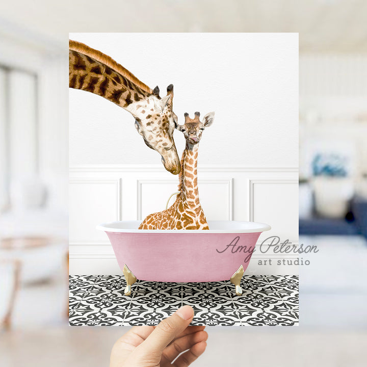 a giraffe sticking its head into a pink bowl