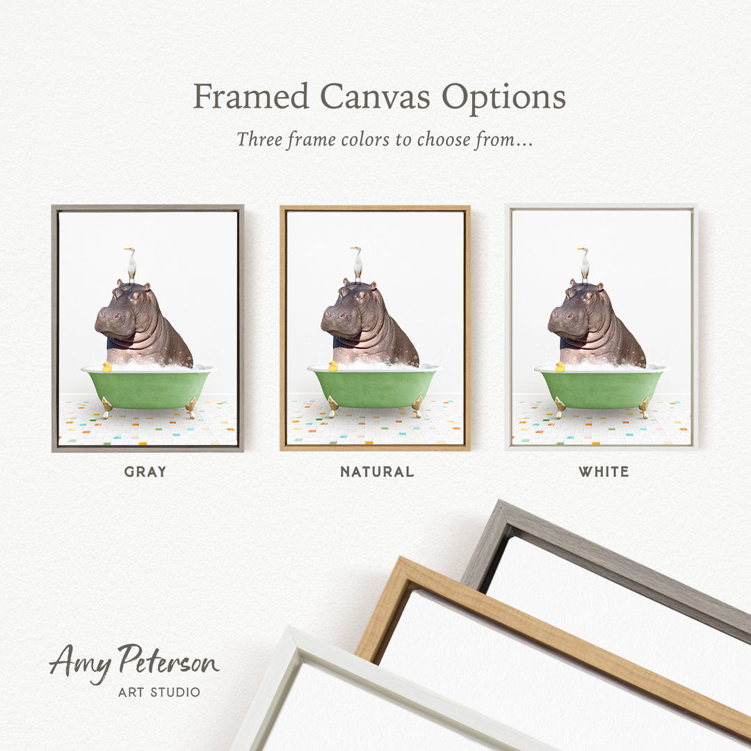 three framed canvas options featuring a hippopotamus sitting in a bathtub, each with a different frame color: gray, natural, and white.